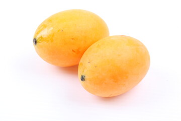 Closeup sweet Marian plum thai fruit isolated on white background (Mayongchid Maprang Marian Plum and Plum Mango,Thailand)