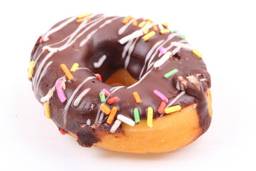 Chocolate sweet mini donuts on white background