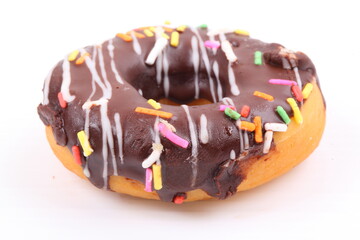 Chocolate sweet mini donuts on white background