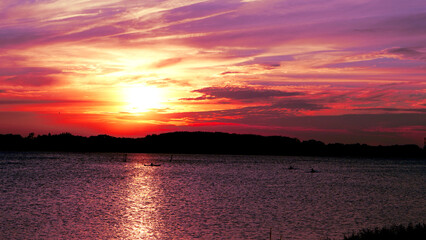 Obraz premium sunset over the river