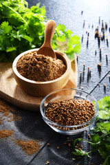 Ground coriander, its dried seeds and fresh leaves