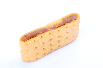 Butter cracker with pineapple jam isolated on the white background