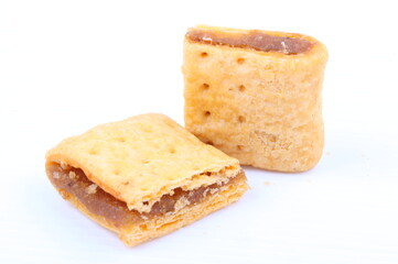 Butter cracker with pineapple jam isolated on the white background