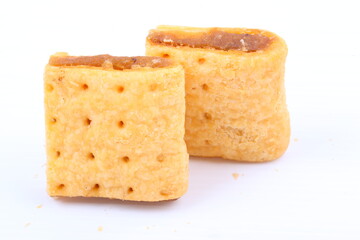 Butter cracker with pineapple jam isolated on the white background