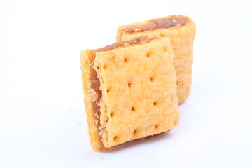 Butter cracker with pineapple jam isolated on the white background
