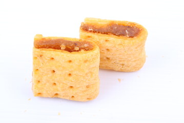 Butter cracker with pineapple jam isolated on the white background