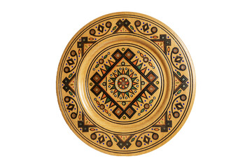 Isolated on white wooden souvenir plate with carved and decorated ornament