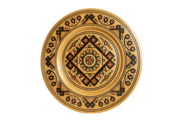 Isolated on white wooden souvenir plate with carved and decorated ornament