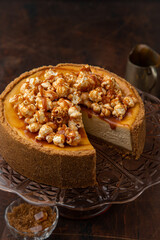 caramel cheesecake with popcorn and salted caramel sauce
