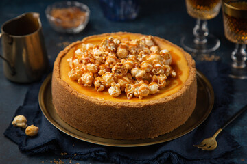 cheesecake with popcorn and salted caramel sauce