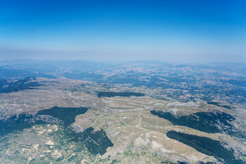 wind farm on barren hills near Macchiagodena, aerial, Italy