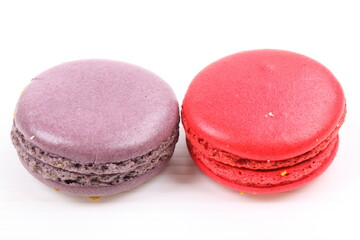 Red and purple macaron isolated in white background