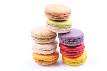 Colorful macarons isolated on white background