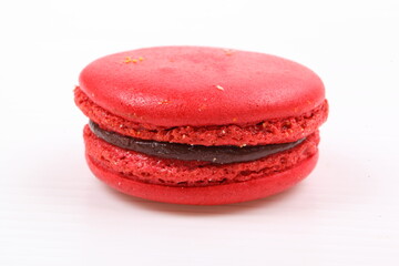 Red macaron isolated in white background