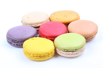 Colorful macarons isolated on white background