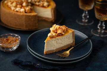 slice of cheesecake with popcorn and salted caramel sauce
