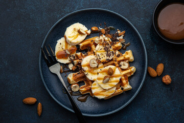 waffles with banana, nuts and salted  caramel sauce
