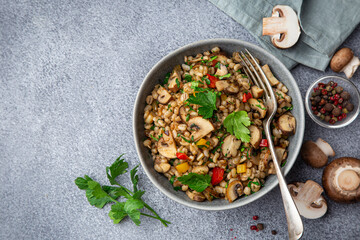 Warm pearl barley salad with mushrooms and vegetables