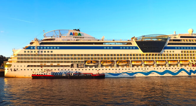 Cruise ship Aida Sol in Hamburg in golden evening light