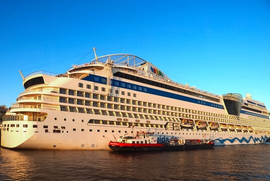 Cruise ship Aida Sol in Hamburg in golden evening light