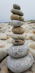 Stack of stones on beach mobile background