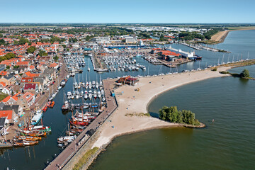 Aerial from the traditional town Urk and the harbor in the Netherlands - obrazy, fototapety, plakaty