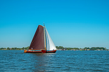 Fototapeta premium Traditional Frisian wooden sailing ship in a yearly competition in the Netherlands