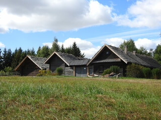 Fototapeta na wymiar old wooden houses in belarusian village