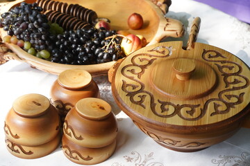 Wooden carved tableware with Kazakh national pattern