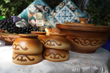 Wooden carved tableware with Kazakh national pattern