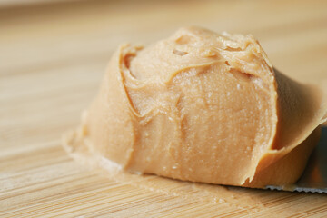 close up of peanut butter on knife 