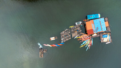 Aerial photography of floating houses in Vietnam. Colorful kayaks. vietnam travel