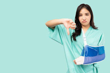 Injured patient girl put on soft splint due to broken arm Woman  feeling cross, angry, annoyed,...