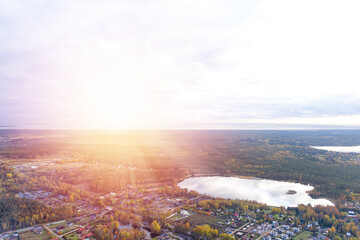 Village with summer houses in Autumn forest. Aerial view