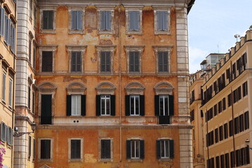 Piazza di Pietra Square Orange Brown Traditional Building Facades in Rome, Italy