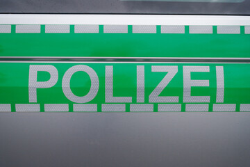 Old police vehicle in Germany with Green Lettering - translation: Polizei.