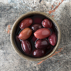 bowl with red kalamata olives close-up
