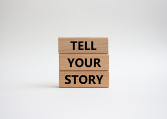 Tell your story symbol. Wooden blocks with words Tell your story. Beautiful white background. Business and Tell your story concept. Copy space.