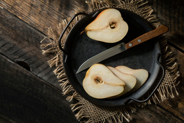 fresh pears on wooden table