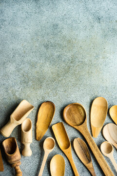 Overhead view of assorted wooden spoons and kitchen cooking utensils