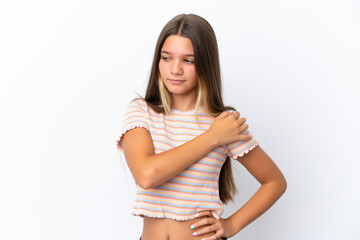 Little caucasian girl isolated on white background suffering from pain in shoulder for having made an effort