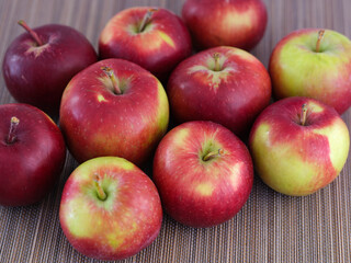 Some fresh organic apples on bamboo napkin