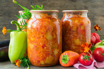 Canned eggplant and bell peppers in tomato sauce. Eggplant and pepper salad in tomato sauce