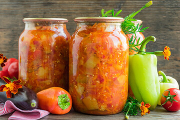 Canned eggplant and bell peppers in tomato sauce. Eggplant and pepper salad in tomato sauce