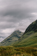 Obraz na płótnie Canvas Mountain with dramatic sky in Scotland.