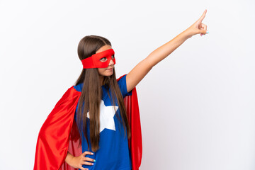 Little caucasian girl isolated on white background in superhero costume with proud gesture