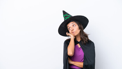 Young hispanic woman dressed as witch over isolated background thinking an idea