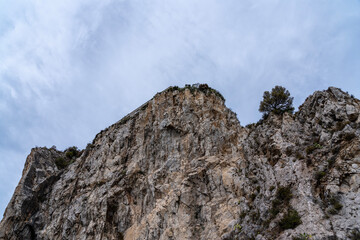 rock coast of liguria on a cloudy day