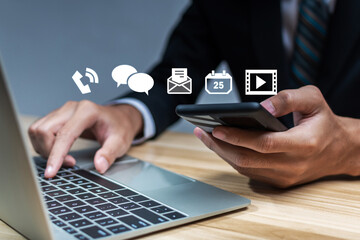 business people hand using mobile smart phone with virtual graphic icon diagram on desk at office, contact us, digital marketing, work from home, business finance, internet network technology concept