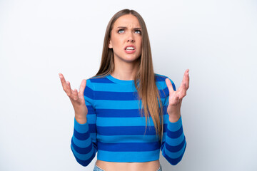 Fototapeta premium Young caucasian woman isolated on white background stressed overwhelmed